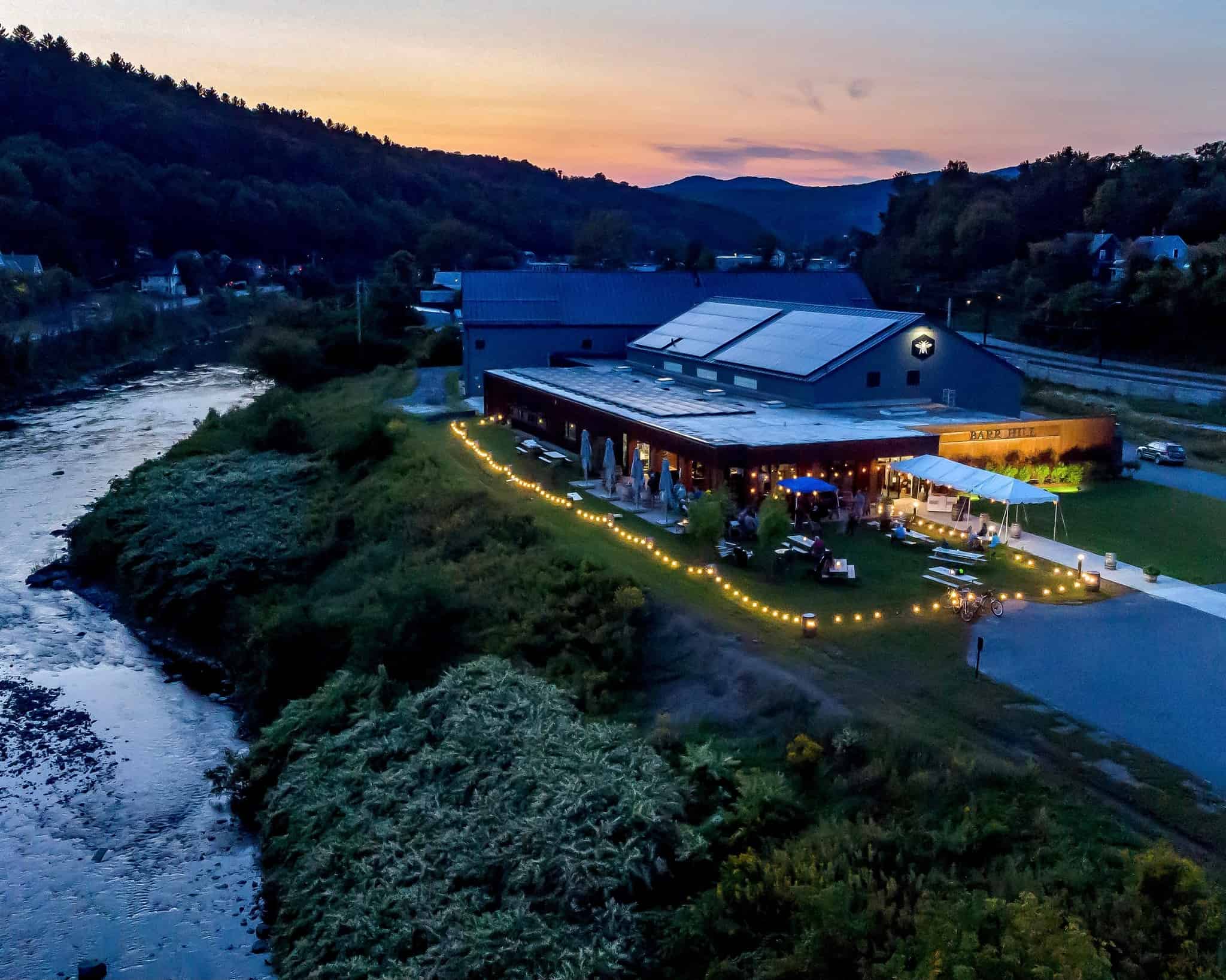Caledonia Spirits - Aerial Exterior at Night next to River