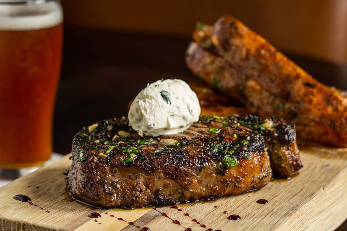 Copper Grouse - Grilled Ribeye with Fries and Beer