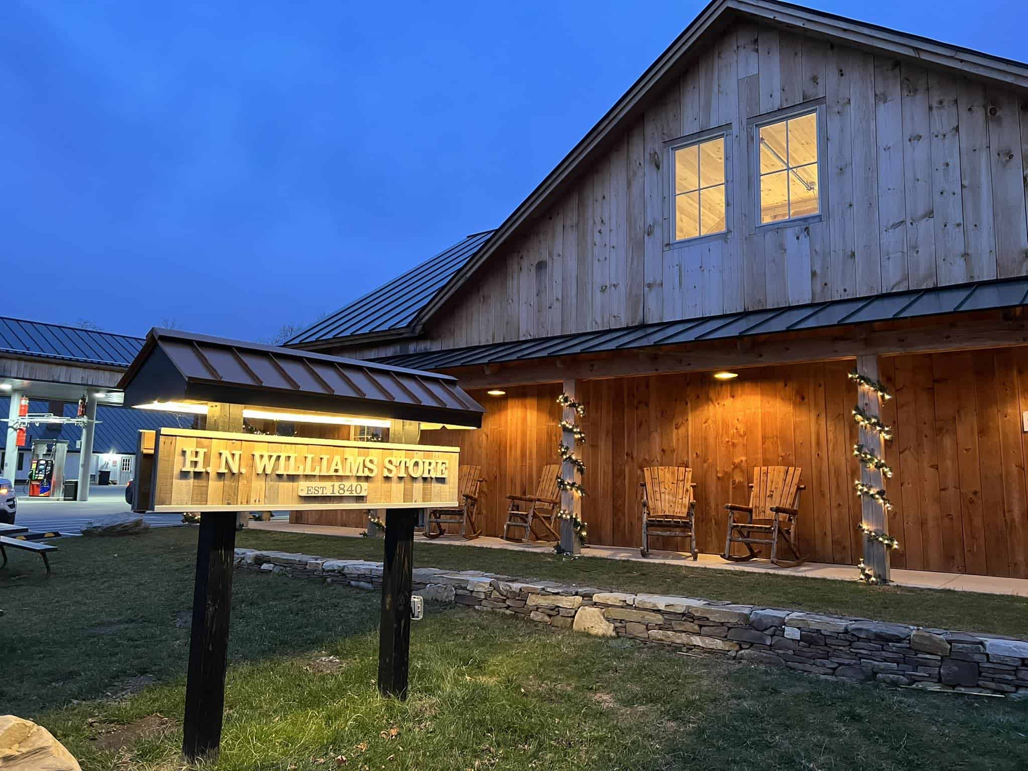 H N Williams Store - Nighttime Exterior with Sign