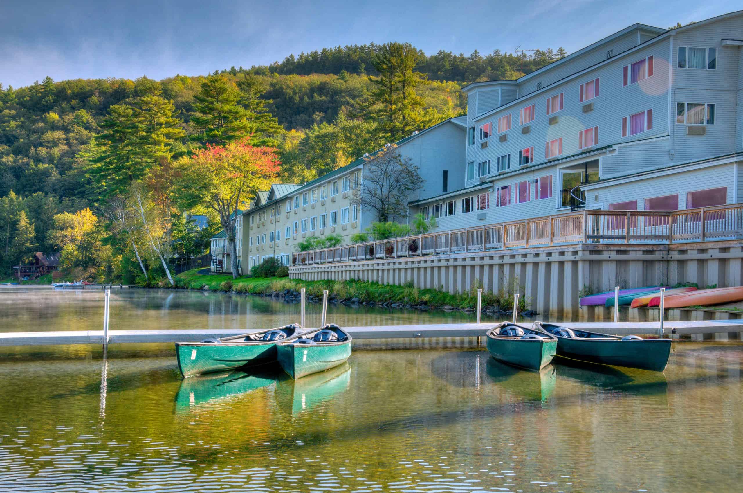 Lake Morey Resort - Summer Building and Dock with Canoes