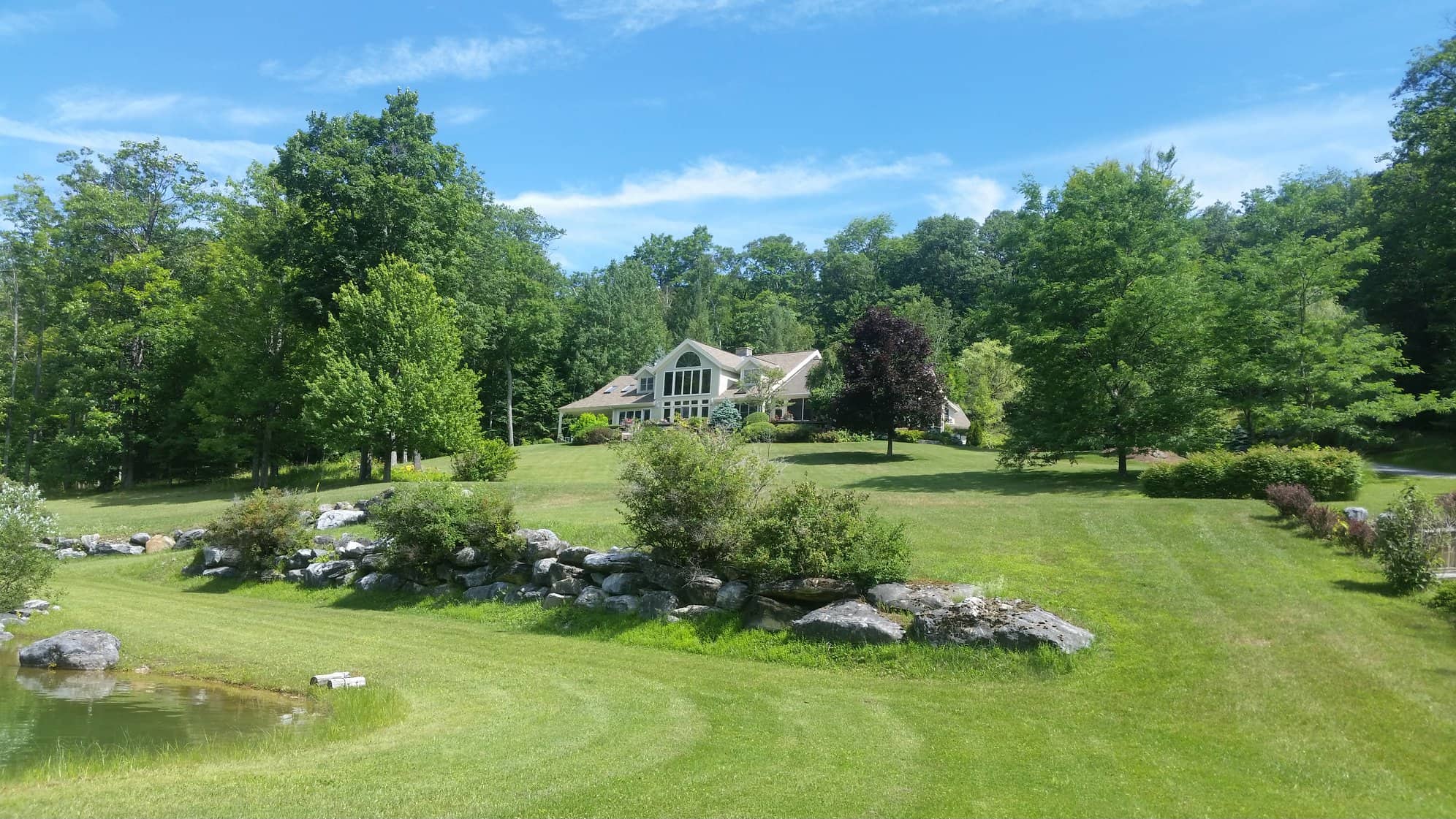 Re:Max Four Seasons Exterior Dorset House in Summer