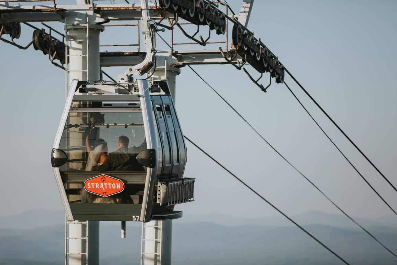 Stratton Mountain Resort Wedding Photos Bride and Groom in Gondola with Mountain Views