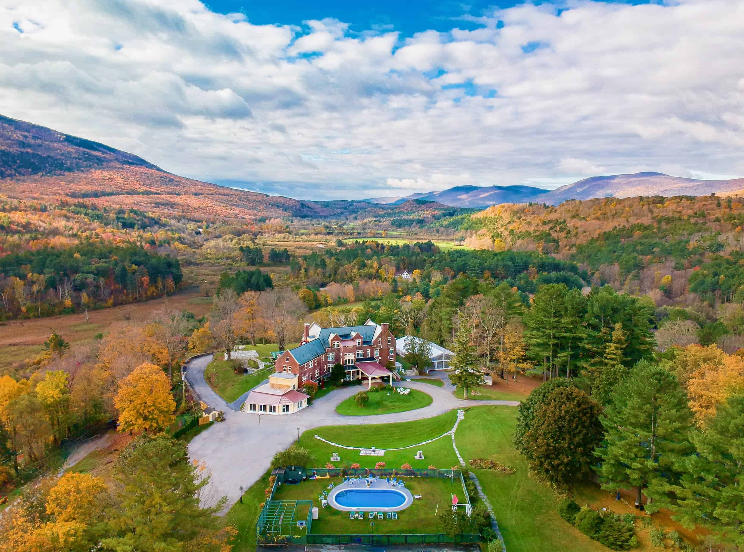 Wilburton-Destination-Resort-Arial-Fall-Foliage-of-Pool-and-Mansion